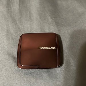 Hourglass powder luminous light